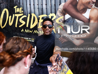 Joshua Boone signing autographs after 'The Outsiders' musical show in Bernard B. Jacobs Theatre on Broadway, New York, United States of Amer...