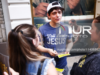 Dan Berry signing autographs after 'The Outsiders' musical show in Bernard B. Jacobs Theatre on Broadway, New York, United States of America...