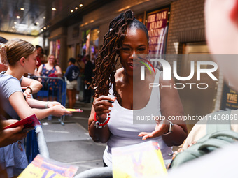 Kecia Lewis-Evans signing autographs after 'Hell's Kitchen' musical show in Shubert Theatre on Broadway, New York, United States of America...