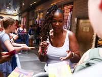 Kecia Lewis-Evans signing autographs after 'Hell's Kitchen' musical show in Shubert Theatre on Broadway, New York, United States of America...