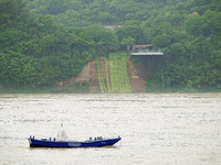 A landslide is occurring near the viewing platform of Mojishan Park on the banks of the Yangtze River in Yichang, Hubei province, China, on...