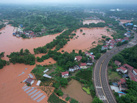 Farmland is flooding along the Xiaoqinglong River at Gaoqiao Street in Neijiang, China, on July 14, 2024. (