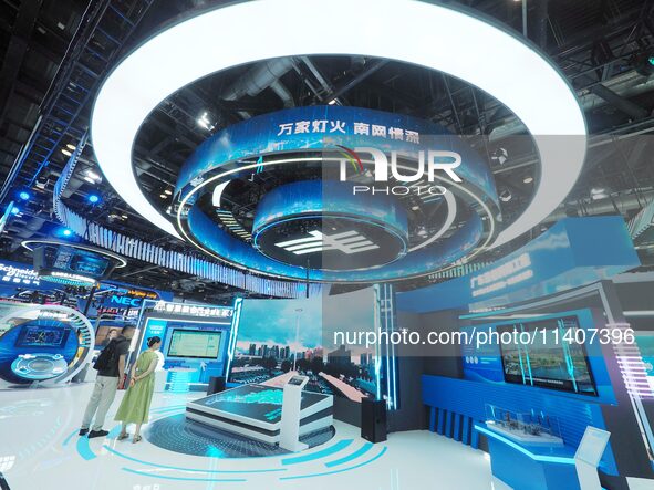 Visitors are visiting the booth of China Southern Power Grid at the 26th China Beijing International Science and Technology Industry Expo in...