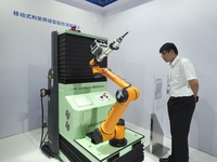 Visitors are visiting a ''Mobile frame weld intelligent inspection robot'' at the 26th China Beijing International Science and Technology In...