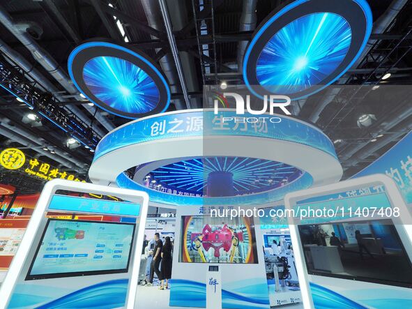 Visitors are visiting the 26th China Beijing International Science and Technology Industry Expo in Beijing, China, on July 14, 2024. 