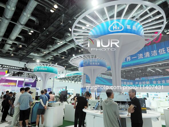 Visitors are visiting hydrogen technology at the 26th China Beijing International Science and Technology Expo in Beijing, China, on July 14,...