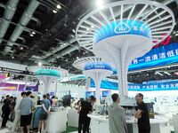 Visitors are visiting hydrogen technology at the 26th China Beijing International Science and Technology Expo in Beijing, China, on July 14,...