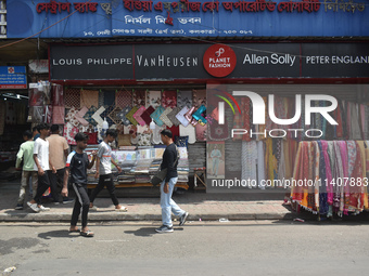 People are selling garments on the roadside in Kolkata, India, on July 14, 2024. (