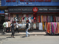 People are selling garments on the roadside in Kolkata, India, on July 14, 2024. (