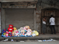 People are selling soft toys on the roadside in Kolkata, India, on July 14, 2024. (