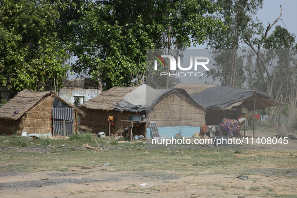 Homes belonging to poor farmers are standing in Najibabad, Uttar Pradesh, India, on April 19, 2024. 