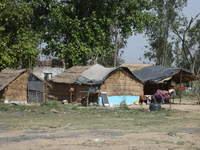 Homes belonging to poor farmers are standing in Najibabad, Uttar Pradesh, India, on April 19, 2024. (