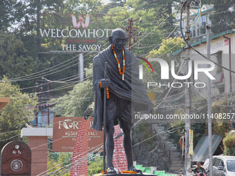 The statue of Mahatma Gandhi is standing along Mall Road in Mussoorie, Uttarakhand, India, on April 18, 2024. (