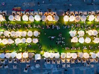 People are eating food at the night market on Nanbin Road in Chongqing, China, on July 14, 2024. It is reported that with the arrival of the...