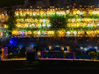 People are eating food at the night market on Nanbin Road in Chongqing, China, on July 14, 2024. It is reported that with the arrival of the...