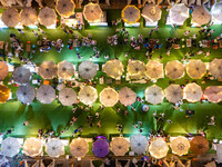 People are eating food at the night market on Nanbin Road in Chongqing, China, on July 14, 2024. It is reported that with the arrival of the...