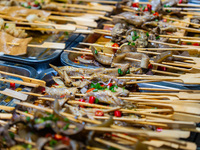 People are eating food at the night market on Nanbin Road in Chongqing, China, on July 14, 2024. It is reported that with the arrival of the...