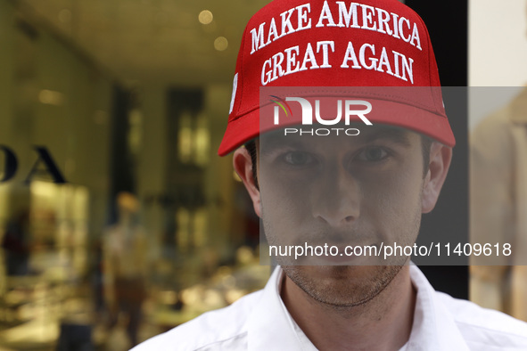 Supporters  of former President Donald Trump’s gather with flags in front of his Fifth Avenue residence on July 14,2024 in New York City, US...