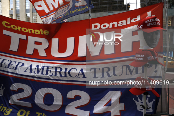 Supporters  of former President Donald Trump’s gather with flags in front of his Fifth Avenue residence on July 14,2024 in New York City, US...