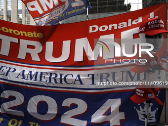 Supporters  of former President Donald Trump’s gather with flags in front of his Fifth Avenue residence on July 14,2024 in New York City, US...