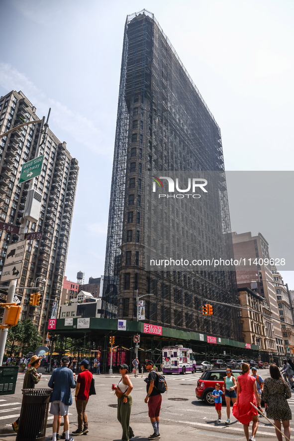 Flatiron Building covered in scaffolding in Manhattan, New York City, United States of America on July 5th, 2024. 