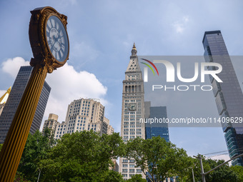 Fifth Avenue Building Gold Clock in Flatiron district in New York City, United States of America on July 5th, 2024. (