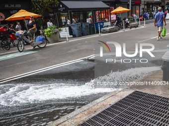 Water flow from a water pump in Manhattan, New York City, United States of America on July 5th, 2024. (