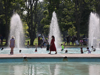 People are cooling off in the water on Centre Island on a hot day in Toronto, Ontario, Canada, on July 13, 2024. (