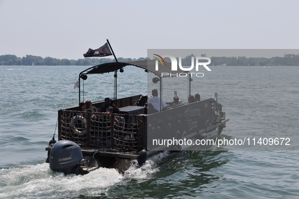 A water taxi is traveling along Lake Ontario in Toronto, Ontario, Canada, on July 13, 2024. 