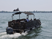 A water taxi is traveling along Lake Ontario in Toronto, Ontario, Canada, on July 13, 2024. (