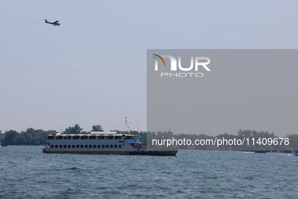 A boat is traveling along Lake Ontario in Toronto, Ontario, Canada, on July 13, 2024. 