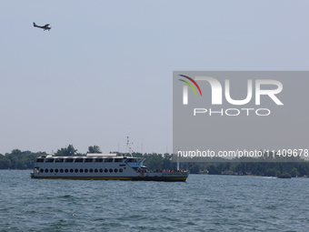 A boat is traveling along Lake Ontario in Toronto, Ontario, Canada, on July 13, 2024. (