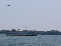 A boat is traveling along Lake Ontario in Toronto, Ontario, Canada, on July 13, 2024. (