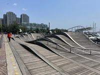 A wavy walkway is appearing at Harbourfront in Toronto, Ontario, Canada, on July 13, 2024. (