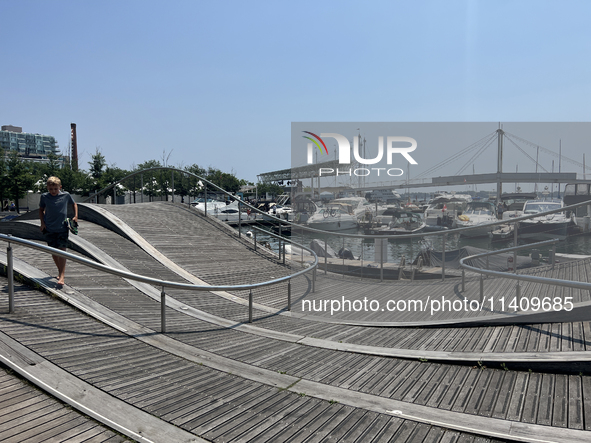 A wavy walkway is appearing at Harbourfront in Toronto, Ontario, Canada, on July 13, 2024. 