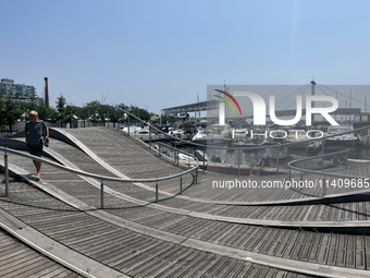 A wavy walkway is appearing at Harbourfront in Toronto, Ontario, Canada, on July 13, 2024. (