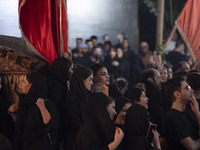 Female worshippers are participating in a religious rally to commemorate Tasoua in the Dolatabad neighborhood in southern Tehran, Iran, on J...