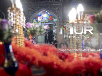 An Iraqi man living in Iran is sitting just outside a mosque during a religious rally to commemorate Tasoua, in Dolatabad neighborhood in so...