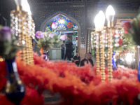 An Iraqi man living in Iran is sitting just outside a mosque during a religious rally to commemorate Tasoua, in Dolatabad neighborhood in so...