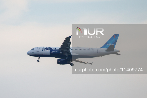 JetBlue airplane is seen flying over Washington, DC in the United States of America on July 9th, 2024. 