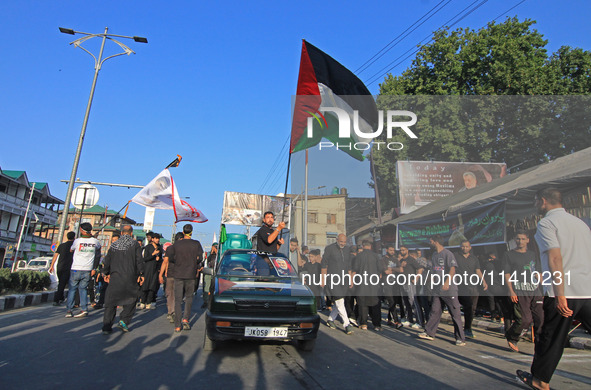 Thousands of Shia Muslims are attending the mourning procession to commemorate the martyrdom of Prophet Muhammad's grandson Imam Hussein (Hu...