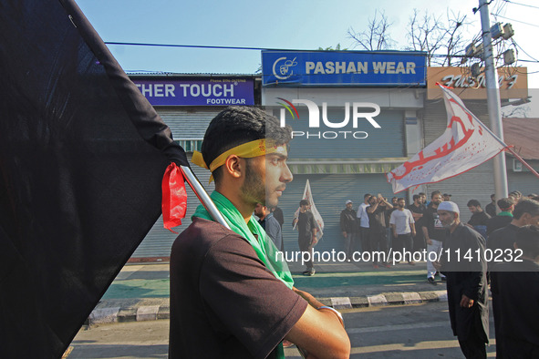 Thousands of Shia Muslims are attending the mourning procession to commemorate the martyrdom of Prophet Muhammad's grandson Imam Hussein (Hu...