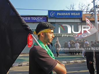 Thousands of Shia Muslims are attending the mourning procession to commemorate the martyrdom of Prophet Muhammad's grandson Imam Hussein (Hu...