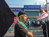 Thousands of Shia Muslims are attending the mourning procession to commemorate the martyrdom of Prophet Muhammad's grandson Imam Hussein (Hu...