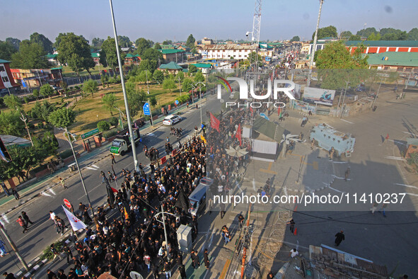 Thousands of Shia Muslims are attending the mourning procession to commemorate the martyrdom of Prophet Muhammad's grandson Imam Hussein (Hu...