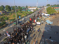 Thousands of Shia Muslims are attending the mourning procession to commemorate the martyrdom of Prophet Muhammad's grandson Imam Hussein (Hu...