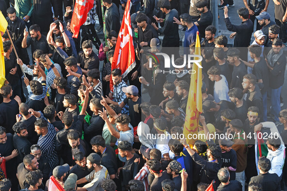 Thousands of Shia Muslims are attending the mourning procession to commemorate the martyrdom of Prophet Muhammad's grandson Imam Hussein (Hu...