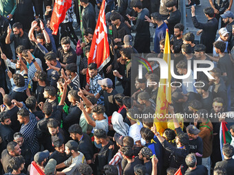 Thousands of Shia Muslims are attending the mourning procession to commemorate the martyrdom of Prophet Muhammad's grandson Imam Hussein (Hu...