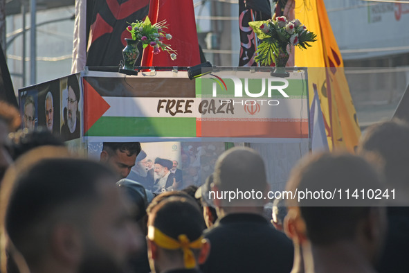 Thousands of Shia Muslims are attending the mourning procession to commemorate the martyrdom of Prophet Muhammad's grandson Imam Hussein (Hu...