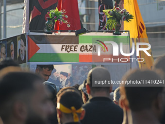 Thousands of Shia Muslims are attending the mourning procession to commemorate the martyrdom of Prophet Muhammad's grandson Imam Hussein (Hu...